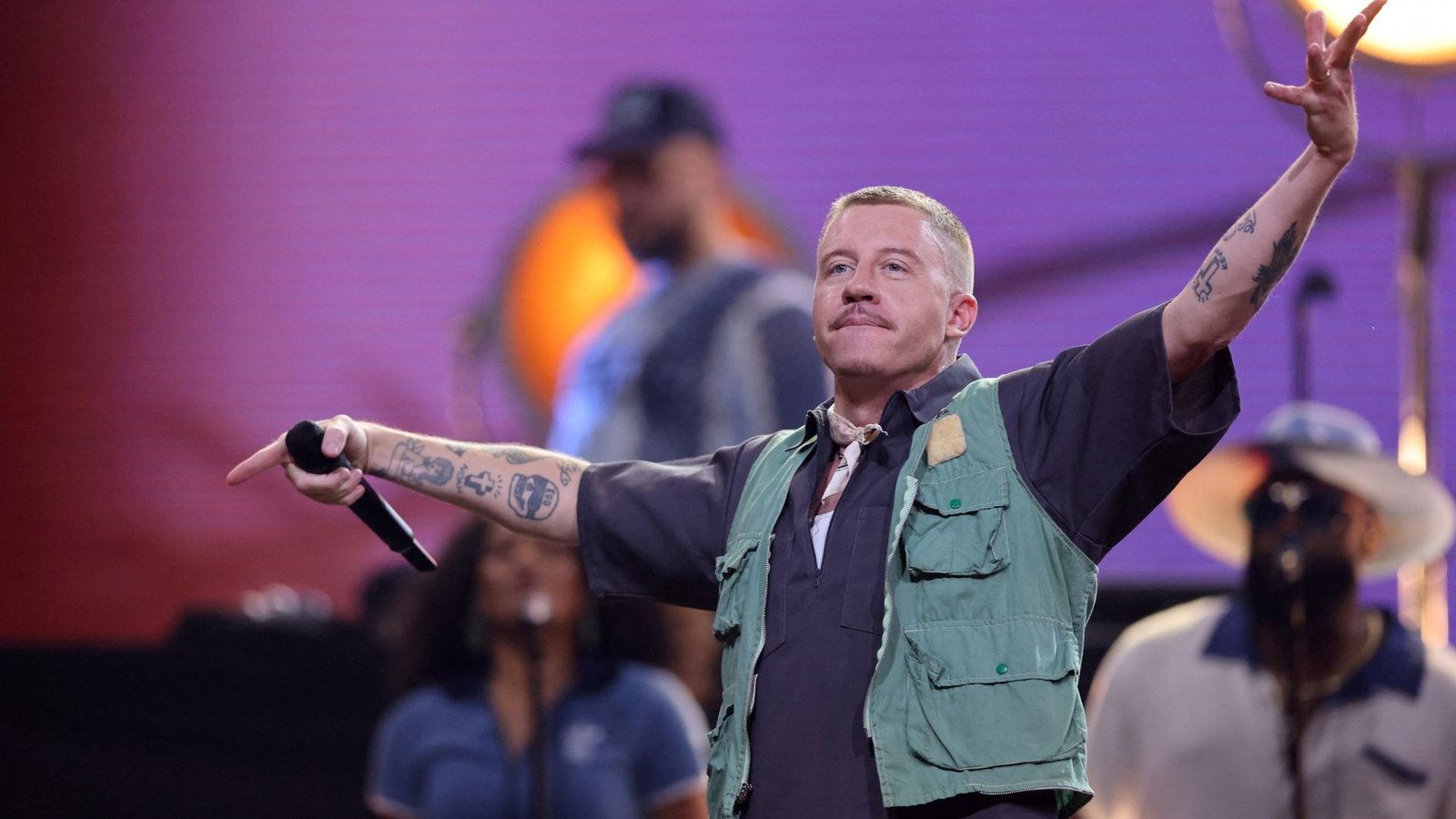 Macklemore announces $1m donation after row over Ed Sheeran tour