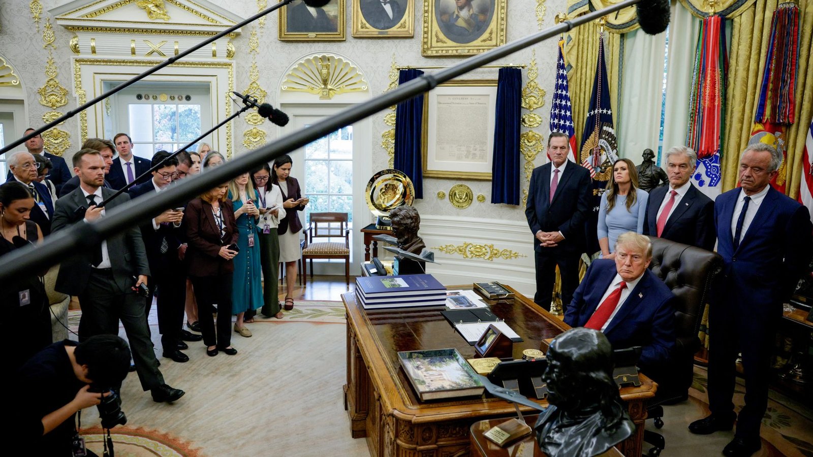Media banned by Trump must have access restored, judge says
